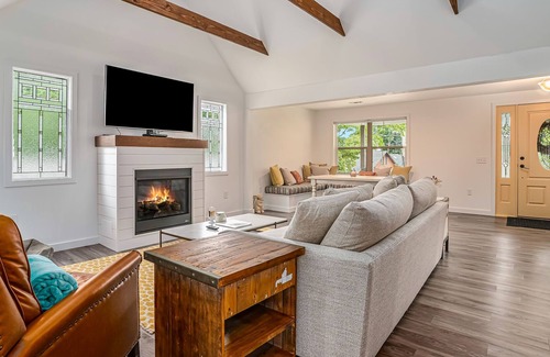 Paw Paw Lake House | Dog-friendly, updated home with deck, front porch, fire pit, WiFi, & fireplace