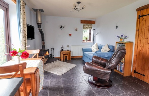 Dolphin Cottage | DOLPHIN BACH, pet friendly, with open fire in Dolphin