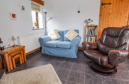 Dolphin Cottage | DOLPHIN BACH, pet friendly, with open fire in Dolphin