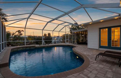 Whitney Beach House | Dolphin Cabin! Available for Summer! Screened Pool, Dock & More!