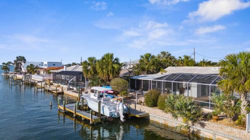 Whitney Beach House | Dolphin Cabin! Available for Summer! Screened Pool, Dock & More!