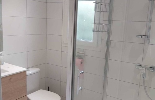 Domino House | DOMINO, renovated 4-bedroom house, 150 m from the small beach.