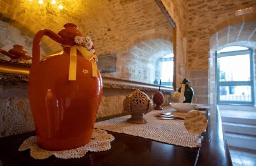 Carovigno House | DOMUS CESARE - dimora storica totalmente in pietra nel cuore del centro storico con cabina doccia pietra in camera e zona relax esterna-historic residence entirely made of stone in the heart of the historic center with stone shower cabin in the room