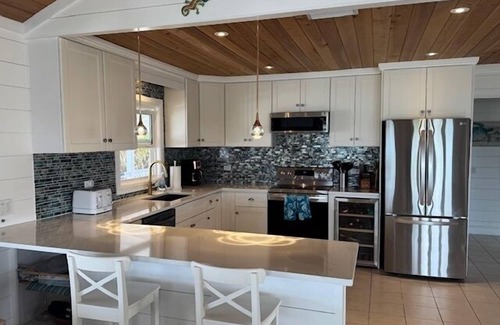 Hope Town Villa | Donald Seas - Seaside Retreat with Breathtaking Views of White Sound & Dock
