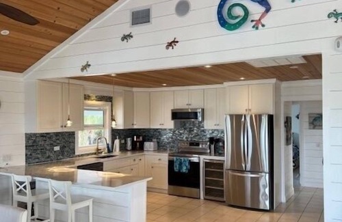 Hope Town Villa | Donald Seas - Seaside Retreat with Breathtaking Views of White Sound & Dock