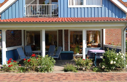 Esens Cottage | Doppelzimmer Knurrhahn in der Hotel-pension Altes Siel - Doppelzimmer Knurrhahn mit Terrasse