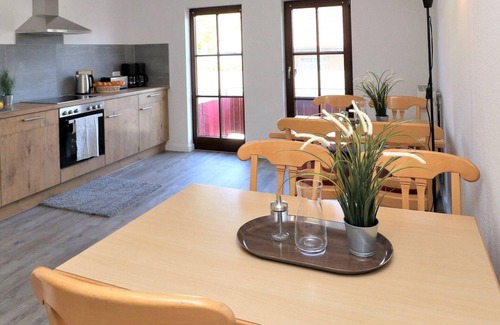 Ostseebad Wustrow Apartment | Double room with balcony and Bodden view directly at the harbor of Wustrow