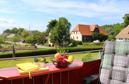 Ostseebad Wustrow Apartment | Double room with balcony and Bodden view directly at the harbor of Wustrow