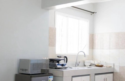 Kampala Apartment | Double Room with Balcony