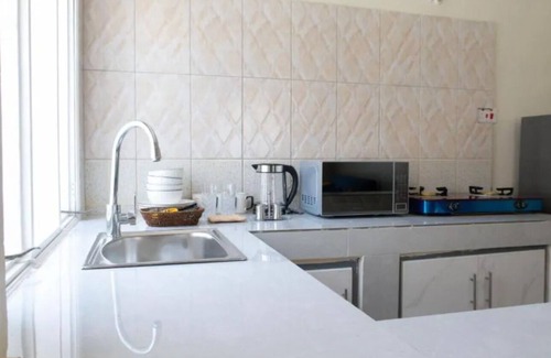 Kampala Apartment | Double Room with Balcony