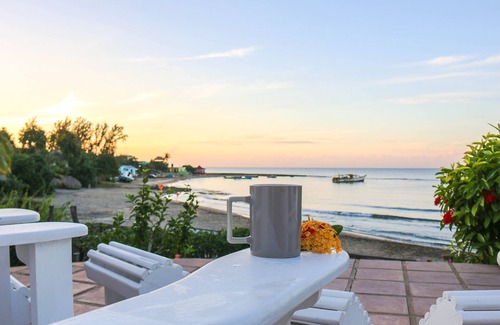 Treasure Beach Villa | Doubloon Villa, large pool and sandy beach at heart of Treasure Beach