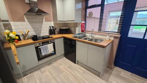 Rocester House | Dovetails, short drive from Alton Towers and Uttoxeter racecourse Games room with Wii and football table