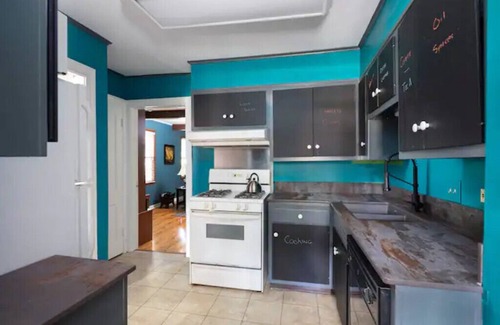 Spartanburg House | Downtown 1930's shingle home with color.