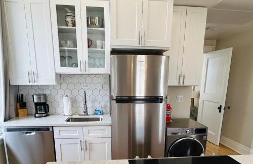 Boise Apartment | Downtown Digs-View of the City! Stay above local restaurants and nightlife, posh amenities heated toilet seat, oversized rain shower head in glass shower, in-unit laundry, one garage parking spot