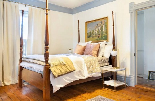 Liberty House | Downtown Liberty Historic Home with Screened Porch