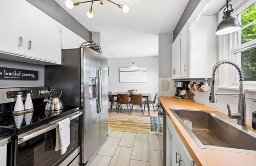 Garden District House | Downtown mid-century home with pet friendly, fenced yard. Sleeps 7