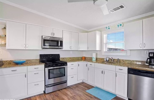 Fort Morgan Pines House | Dragonfly Cottage with views of Mobile bay/short walk to Gulf of Mexico