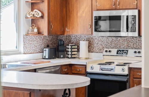 Bel Aire House | Dreamy Hilltop BelAire Retreat w/Hot Tub & Views