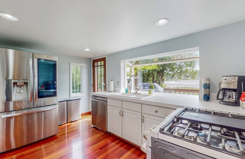 Burley House | Dreamy waterfront haven with beach, pond, trails, kayaks, hot tub & shuffleboard