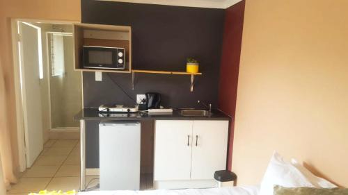Greater Johannesburg Metropolitan Area Apartment | Dumelang Executive Lodge- Cottages in Sandton
