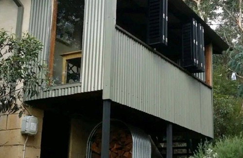 Mount Victoria House | Eco Friendly straw bale home. Nestled into natural settings. Near Pulpit Rock.