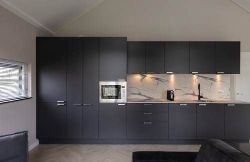 Oirschot House | Eco Villa in Latour by Scenic Pond