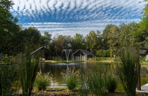 Oirschot House | Eco Villa in Latour by Scenic Pond