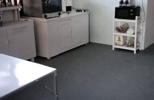 Rayong Apartment | Economy double room with fan only and external bathroom facilities
