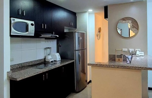 Simon Bolivar Apartment | Ecuabook Torre Sol Departamento Familiar 901