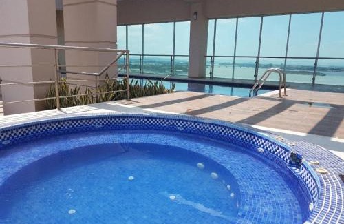Puerto Santa Ana Apartment | Ecusuites Riverfront l Balcony
