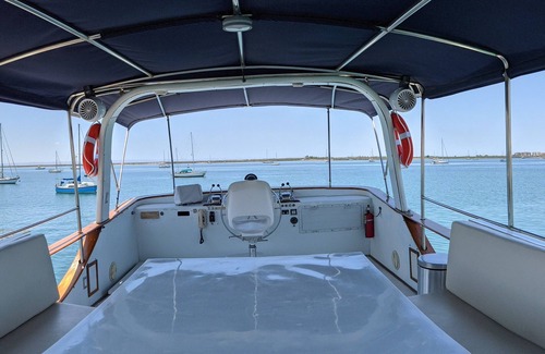 La Paz Boat Rental | "El Don" is a 65ft Classic Hatteras luxury yacht docked in La Paz, Mexico.