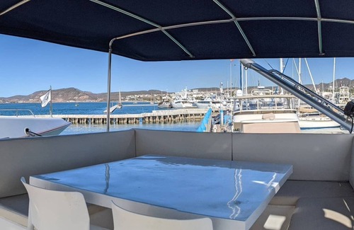 La Paz Boat Rental | "El Don" is a 65ft Classic Hatteras luxury yacht docked in La Paz, Mexico.