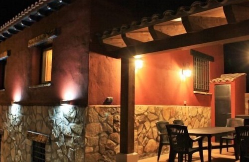 Una Cottage | El Escalerón II House | Monteagudillo Accommodation. Patio, barbecue and fireplace