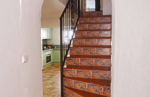 Riogordo House | El Patio de Lola, an Andalusian village house with green marble splash pool.
