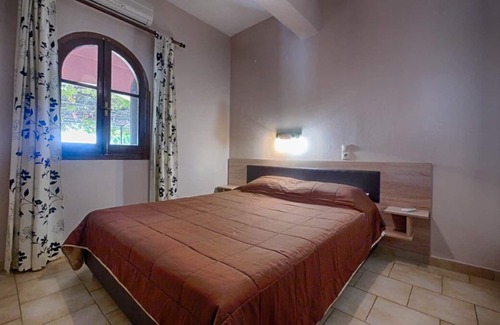 Agios Georgios Pagon Apartment | Eleana holiday apartment 6 EC - with sea view and direct beach location in Agios Georgios Pagi