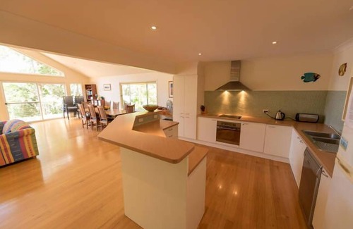 Smiths Lake House | Eleebana~Wood fire~Kayaks~Kids retreat with soccer table~inhouse movies NBN