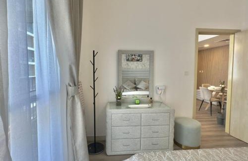 Dubai Production City Apartment | Elegant 1BR Midtown Near City Center Meaisem by Vibel