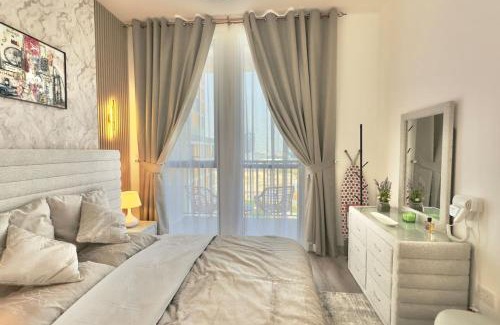 Dubai Production City Apartment | Elegant 1BR Midtown Near City Center Meaisem by Vibel