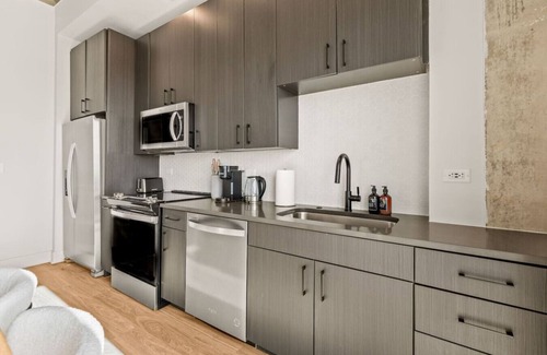 Channel District Apartment | Elegant 1BR Walkable to Dining, Pool + Gym