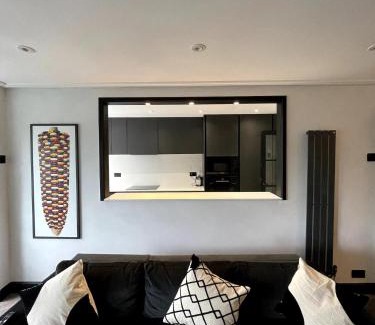 Brondesbury Park Apartment | Elegant 2-bed Oasis: Renovated, Artful Decor & Sunlit w/Parking in Queens Park
