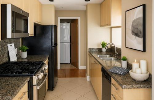 Coal Harbour Apartment | Elegant 2 Bedroom with Sweeping Ocean and Mountain Vistas