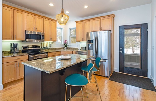 West Wing Estates House | Elegant 3 BR Home with Screened Porch, Year Round Pool & Hot Tub