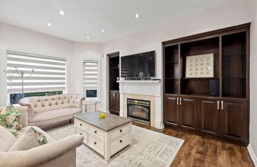 Hurontario House | Elegant 5-Bedroom Family Home Patio & Fireplace