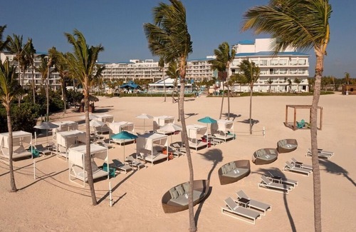 Punta Cana Apartment | Elegant Art Suite: Freestanding Tub, Rainforest Showers, and Premium Benefits