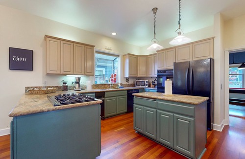 North Admiral House | Elegant dog-friendly home near Seattle Aquarium with game room, fireplace & W/D