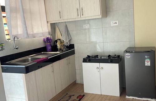 Juja Apartment | Elegant studio with WiFi ,Lift and fitness room in Juja town