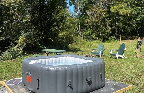 Newport RV Rental | Elevated Glamping with HotTub Near PF, GBurg and Asheville