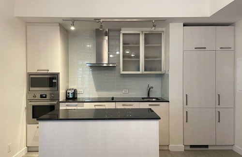 Central Waterfront House | Elite Urban Lodgings | Executive Escape
