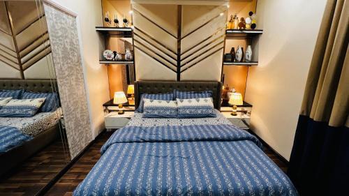 Blue Area Hotel | Elysium Tower Signature Apartments Opposite Centaurus Mall Islamabad