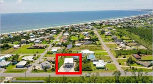 Port St. Joe Villa | Emerald Coast Retreat 2 4person golf carts large swim spa included
